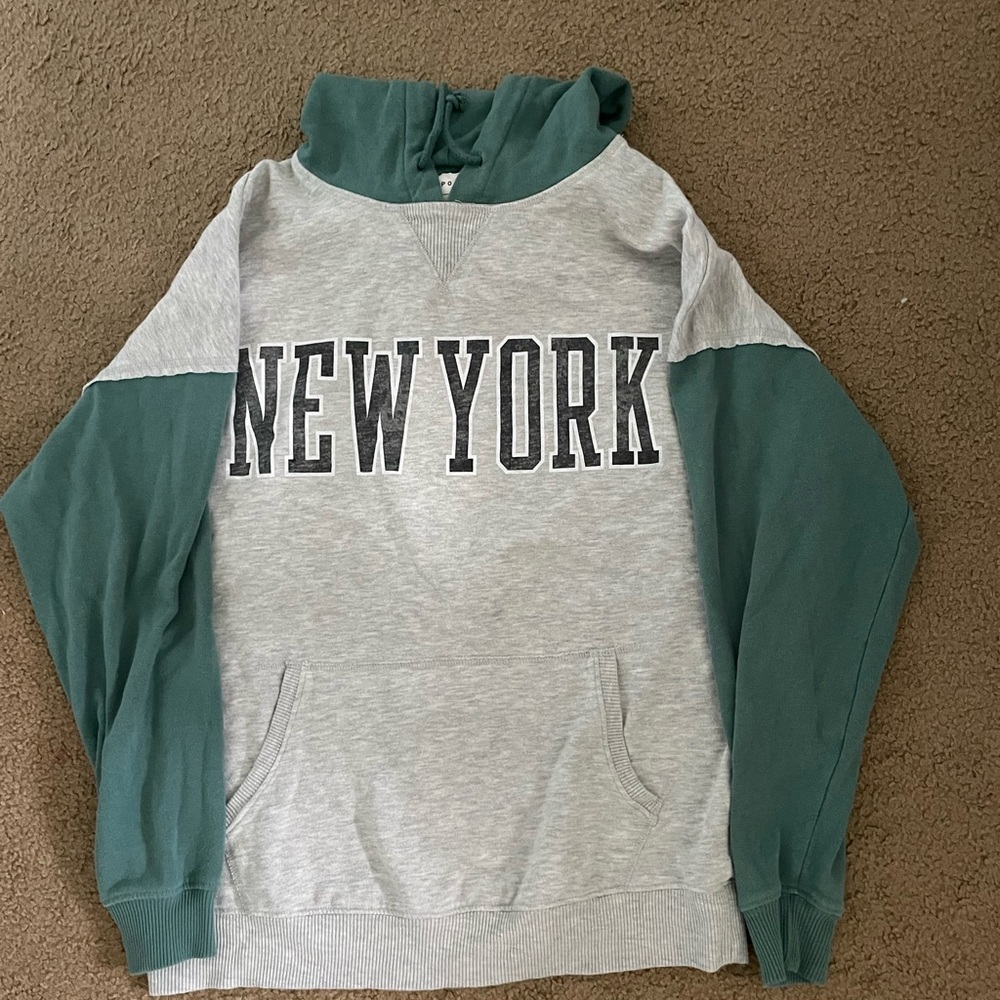 Hoodie with green sleeves